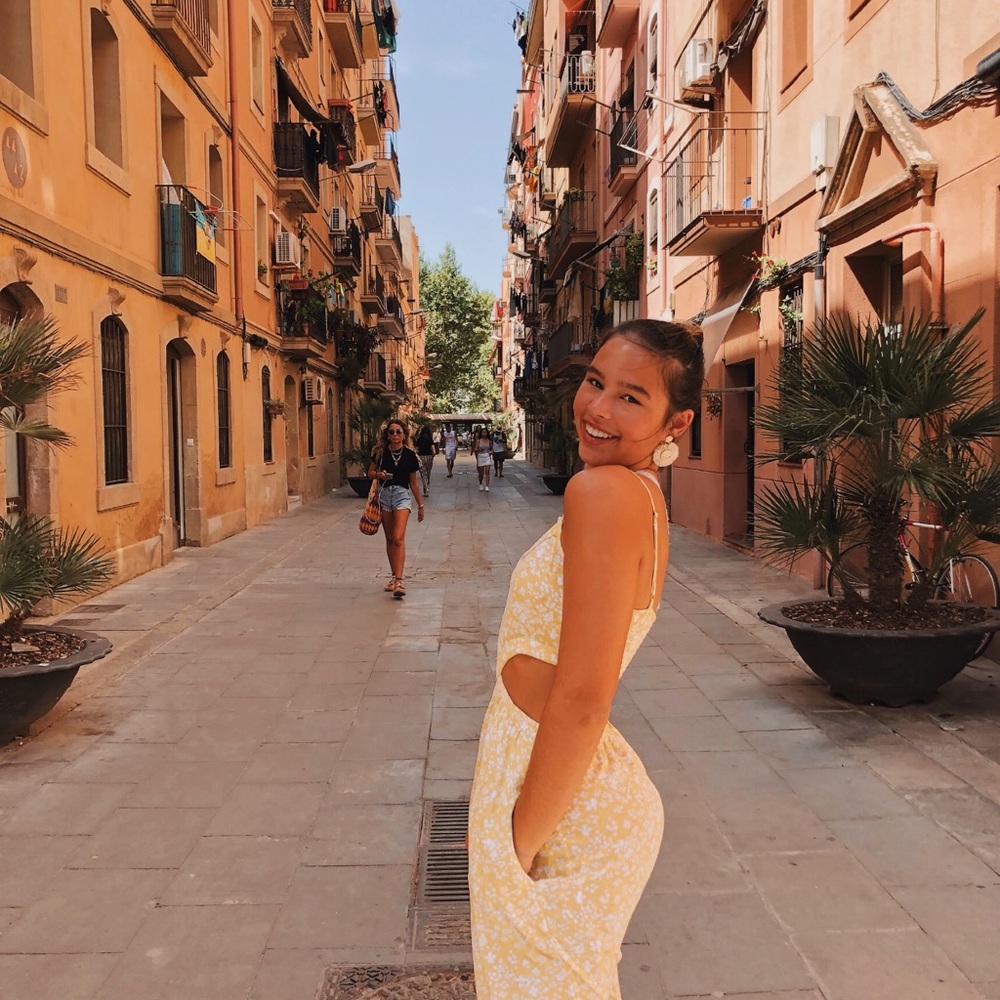 yellow floral jumpsuit with cutouts